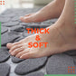 🛁 Memory Foam Pebble Bath Mat with a Non-Slip Backing